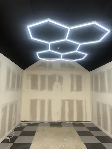 Hexagonal LED ceiling lighting installation progress