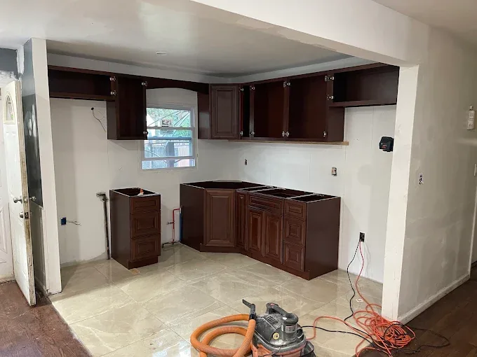 Kitchen renovation with dark wood cabinetry